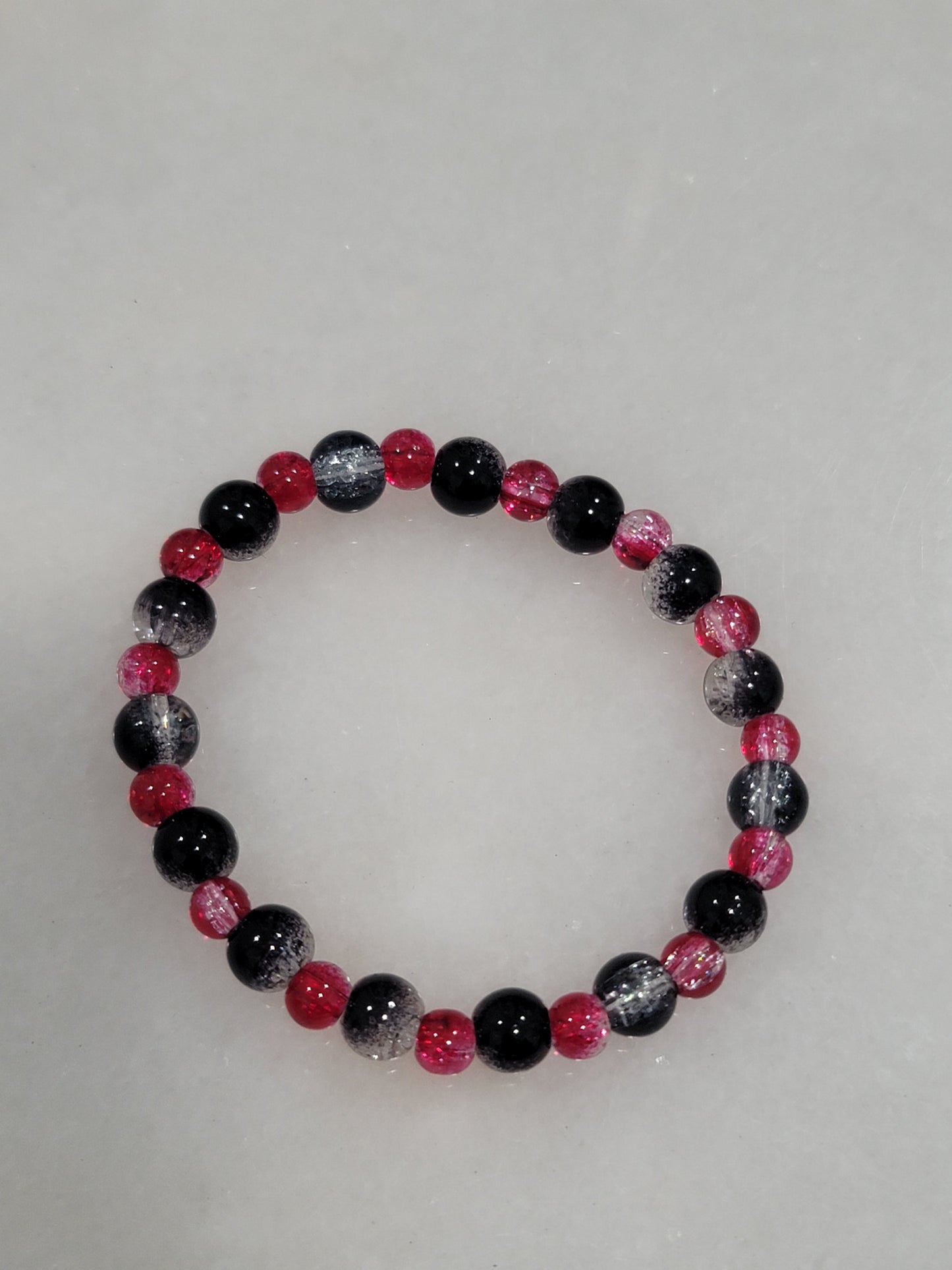 Handmade by BB Black red bead stretch bracelet