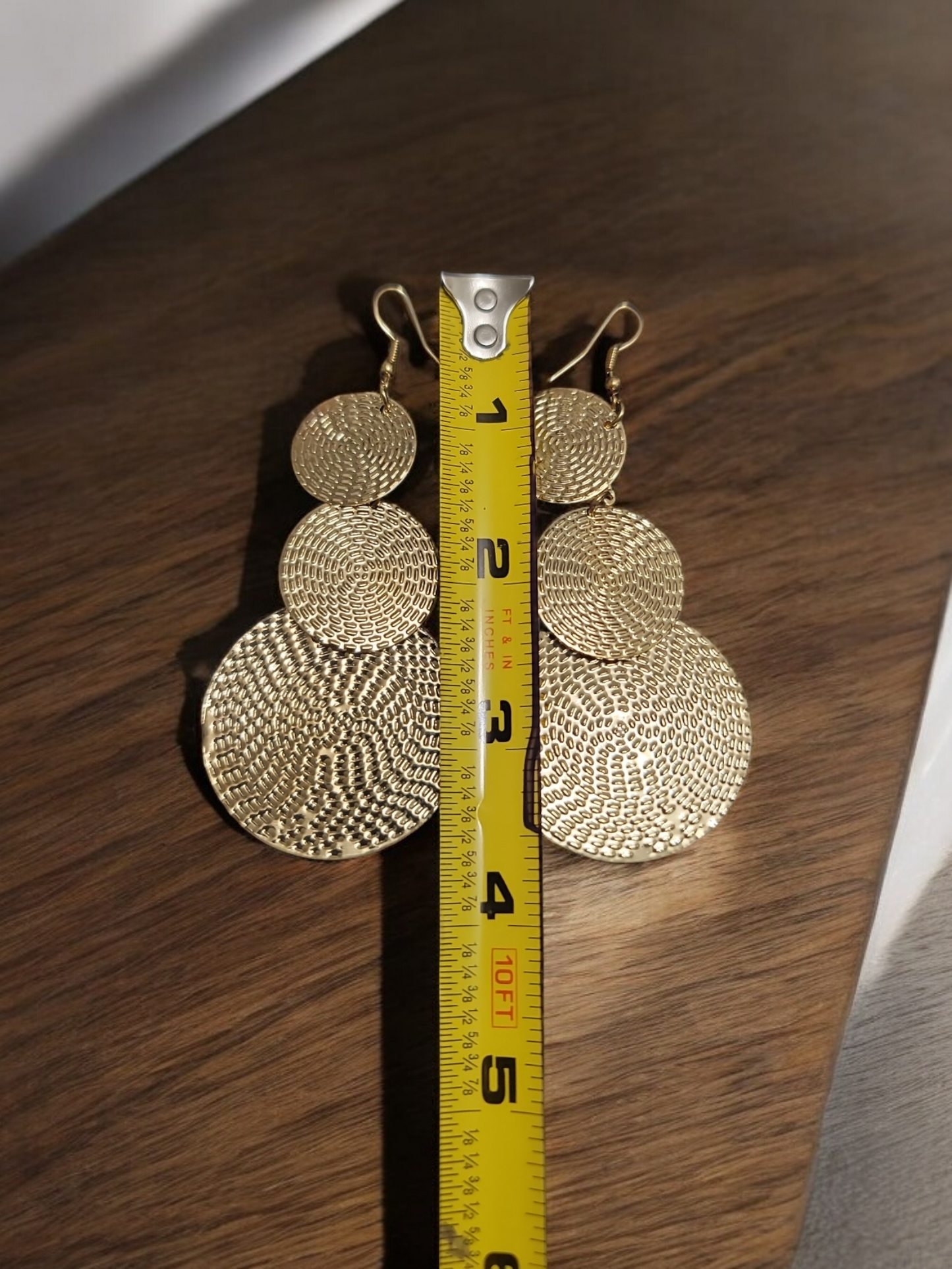 Gold tone light weight statement dangle earrings