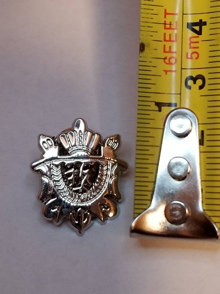 Silver shield pin badge