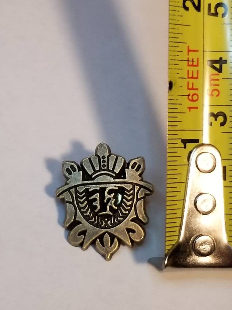 Shield pin badge