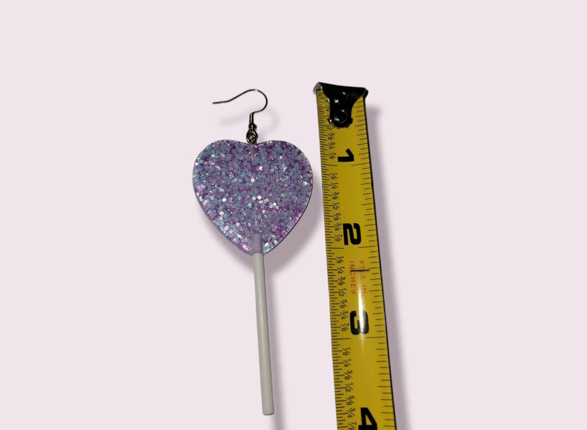 Purple glitter heart lollipop earrings