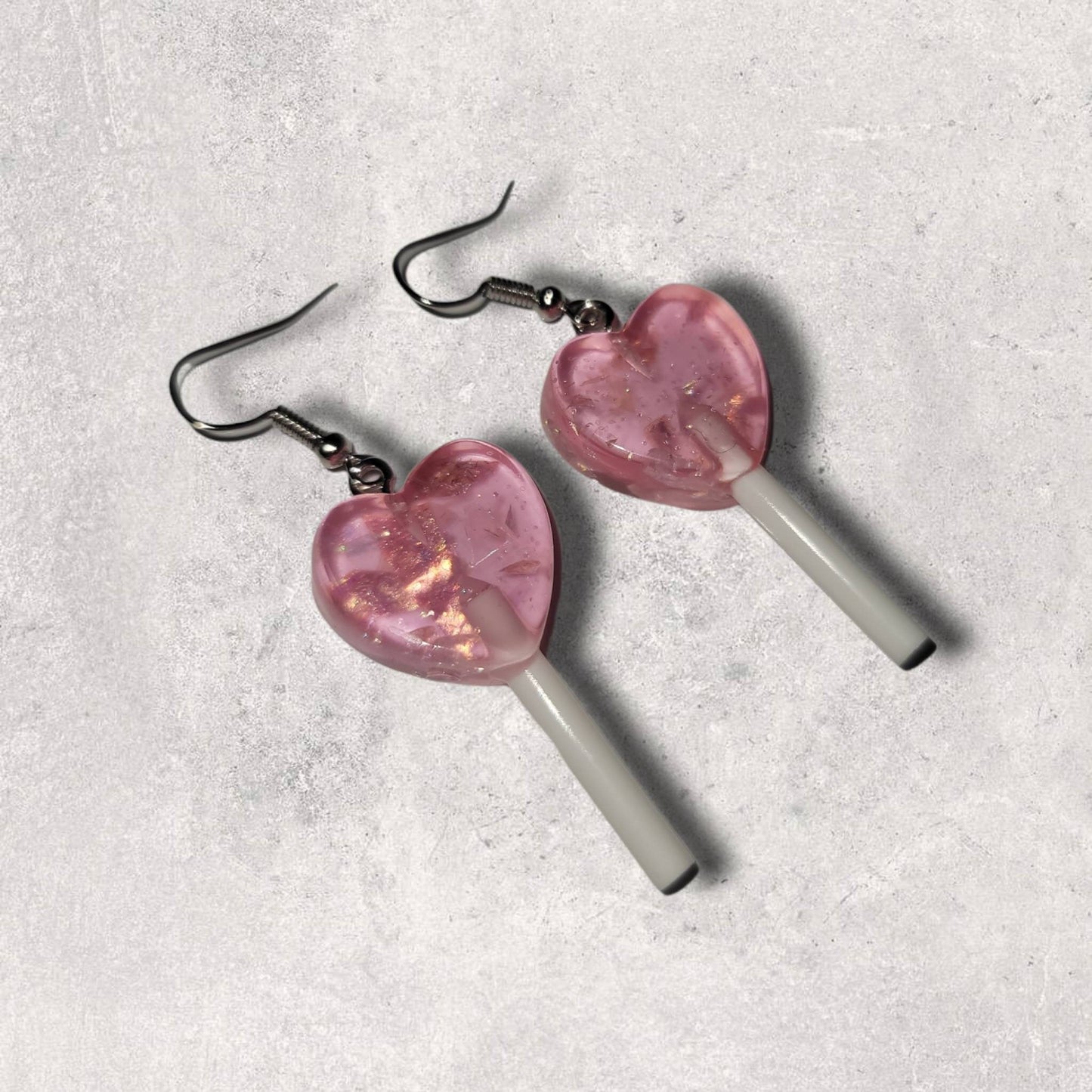 Small pink sparkle heart lollipop earrings