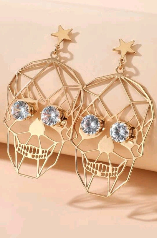 Gold rhinestone skull dangle post earrings