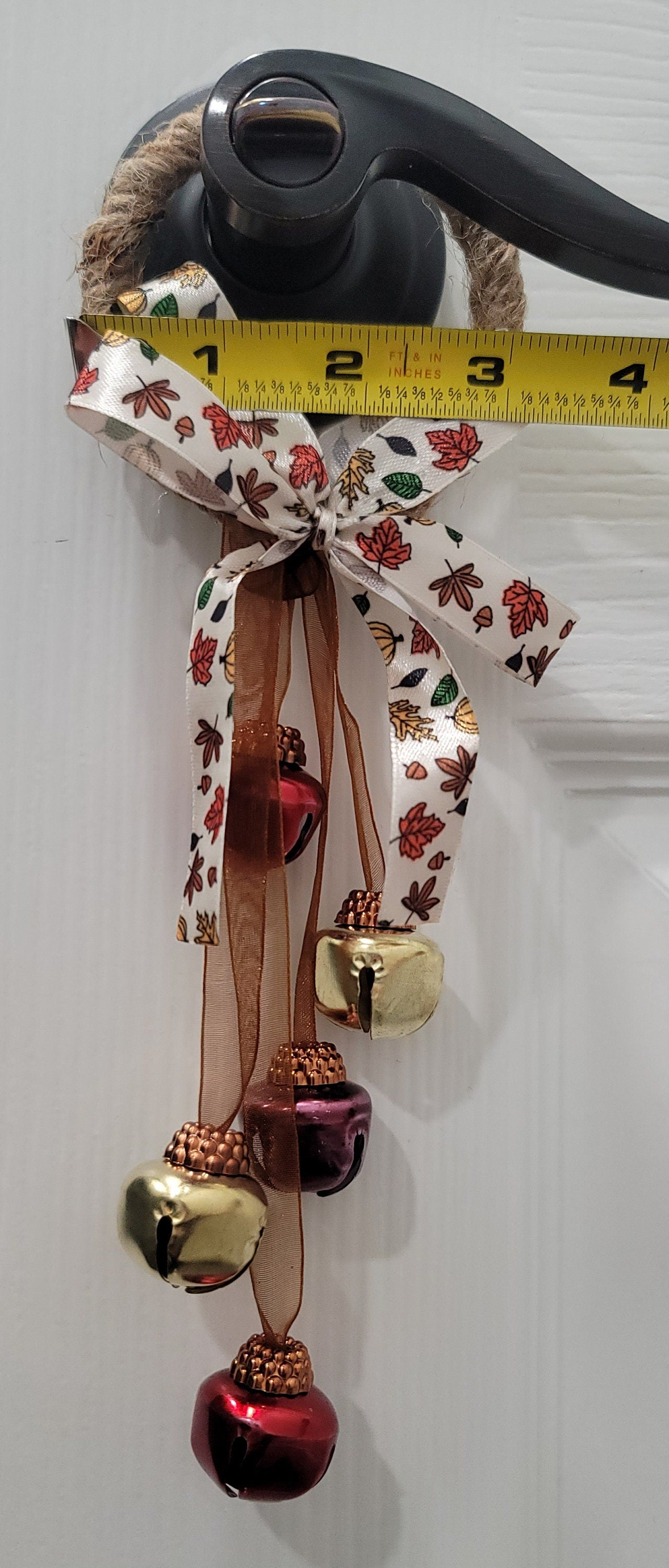 Fall bell door knob hanger