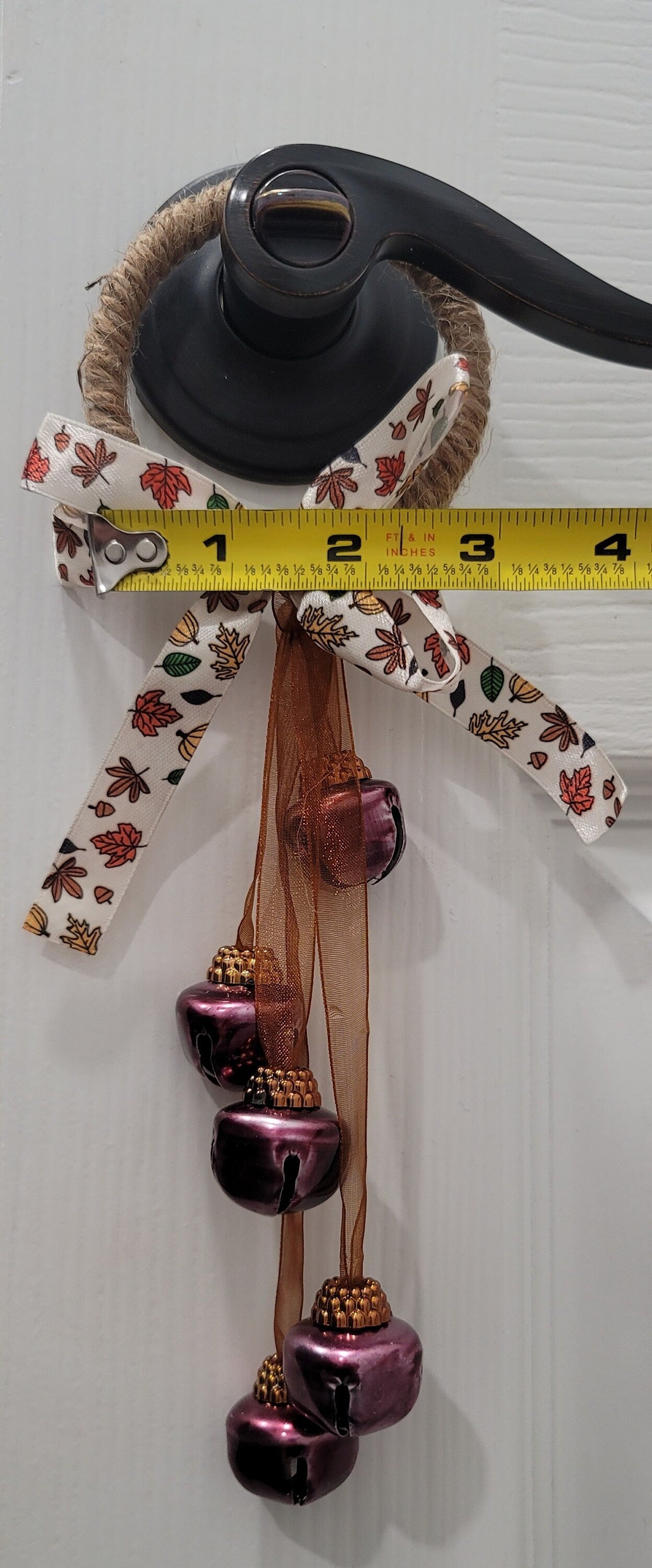 Fall bell door knob hanger