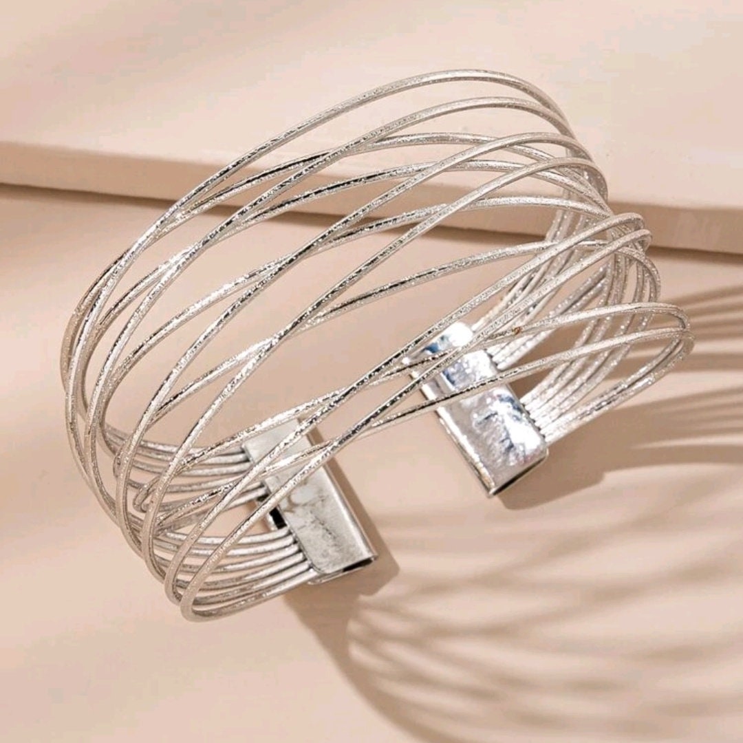 Silver hollow cuff bracelet